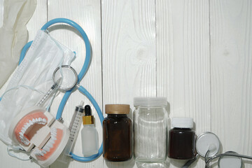 Dental care idea on white wood surface with space for text.