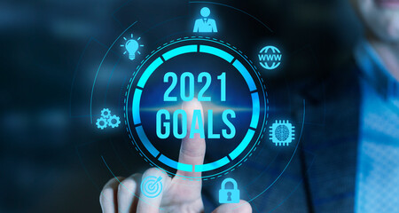 Internet, business, Technology and network concept.virtual screen of the future and sees the inscription: 2021 goals