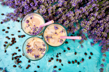Summer drink iced coffee with lavender in glass
