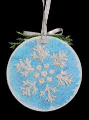 Homemade Christmas tree decoration ball  made of wood, plaster and glitters isolated