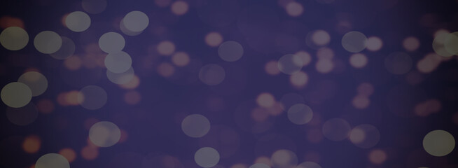 festive bokeh on a blue and purple background. Merry christmas and Happy New Year. Background for the design.