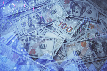 Double exposure of forex graph drawing over us dollars bill background. Concept of financial markets.