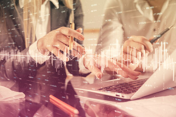 Double exposure of man and woman working together and forex chart hologram. Business concept. Computer background.