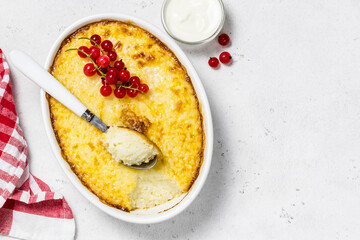 Rice baked pudding in a baking dish. Space for text, top view.