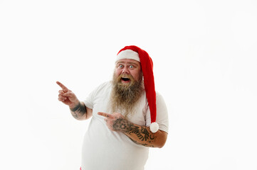 Isolated portrait on a white background of an overweigh man in Santa Claus hat gesturing with...