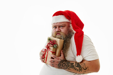 Isolated portrait on a white background of an overweigh man in Santa Claus hat expressing emotions...