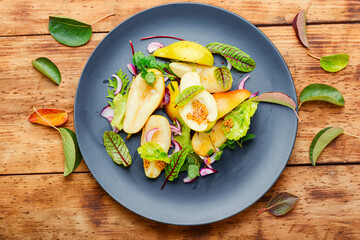 Healthy vegetarian salad with pear.
