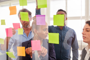 Creative team brainstorming with sticky notes