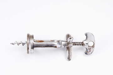 Bottle opener corkscrew vintage on a white background.
