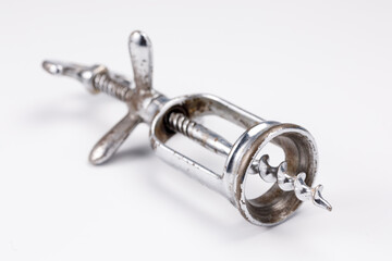 Bottle opener corkscrew vintage on a white background.