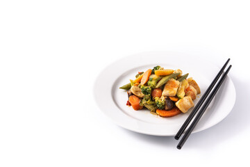Stir fry chicken with vegetables on plate isolated on white background