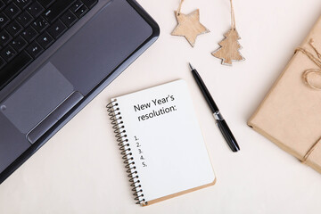 Notepad with a list of New Year's resolutions
