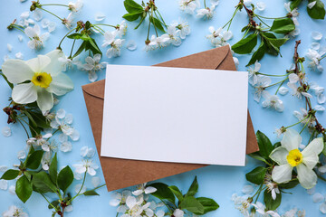 postcard layout. spring composition. floral frame made of  branches, envelope and space for text....
