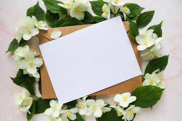 postcard layout. spring composition. floral frame made of  branches, envelope and space for text. congratulation. invitation