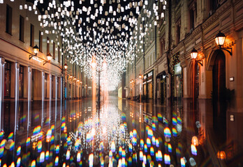  Christmas Decorations With Light Garlands Over The Night Sky in Moscow. New Year Celebration,...