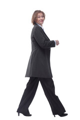 Side view portrait of active senior woman looking at camera