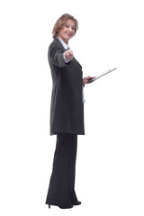 Mature smiling businesswoman portrait holding clipboard with paper sheet and making notes.
