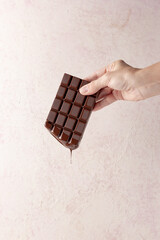hand holding chocolate