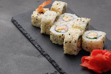 Japanese sushi roll on plate close up