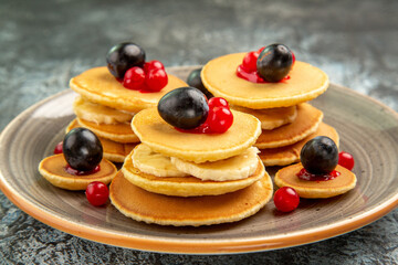 Close up view of easy homemade fruit pancakes on background