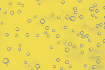 Gray Bubbles on yellow background. Closeup