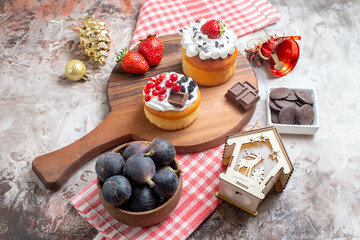 front view yummy cakes with fresh fruits on light background color biscuits sweet cake dessert