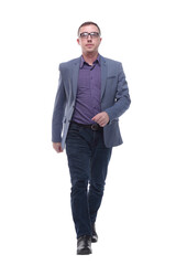 Happy businessman walking in front of the camera