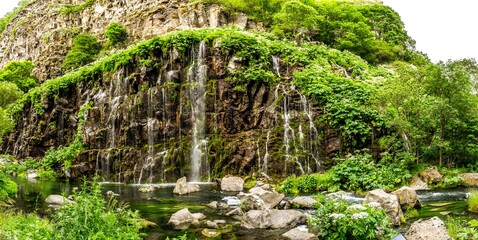 CAscading waterfall of Dashbashi canyon in Georgia. Travel destination in caucasus