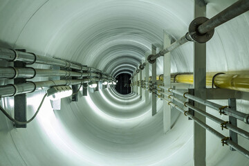Confined space inside underground tunnel. Construction from engineering technology for...