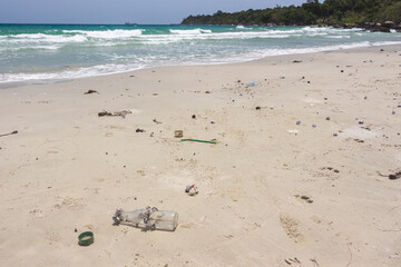 Fototapeta na wymiar Plastic pollution on a beatiful beach at Koh Rong