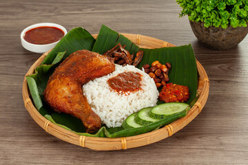 Nasi Kukus is a traditional delicacy originally from the East Coast of Peninsular Malaysia....