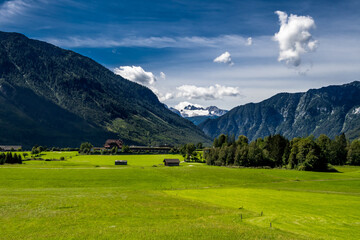 Rural Landscape With Houses In Front Of Mountain Dachstein In The Alps Of Austria