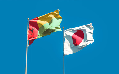Flags of Japan and Guinea-Bissau.