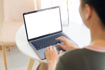 computer screen blank mockup.hand woman work using laptop with white background for advertising,contact business search information on desk at coffee shop.marketing and creative design