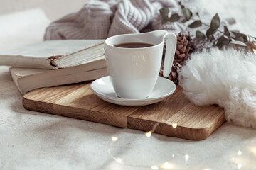 Composition with white cup and saucer close up.
