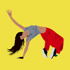 Young woman dancing hip-hop or break-dance on the floor