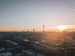 Beautiful Sunrise Morning above Berlin, Germany with Skyline Building Silhouette of Alexanderplatz and Smoke