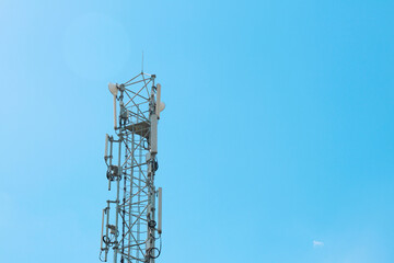communication tower against a blue sky