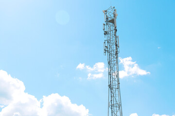 communication tower against a blue sky