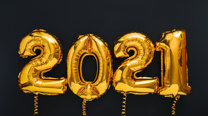 2021 year Christmas gold air balloons on black background. Happy New year 2021 eve. Long web banner