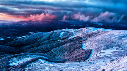 An unique sunset over the Wielka Rawka seen from the Mount Tanica. Bieszczady National Park. Carpathian Mountains. Poland