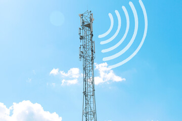a radio tower with antennas that broadcasts a signal against the background of a blue sky with clouds