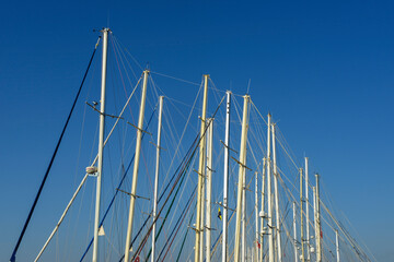 Masts of sail boats yachts in the port of Bodrum. Mugla, Turkey.