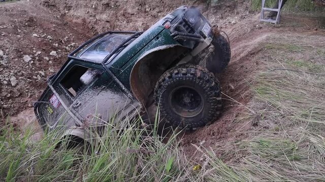 Offroad racing in jeeps in the swamp. Zub Trial. Ukraine, Lviv region. The city of Lubin on August 4, 2020