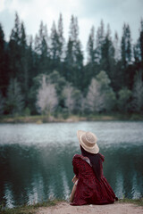 A woman sitting near lake at Liwong, Songkhla, Thailand