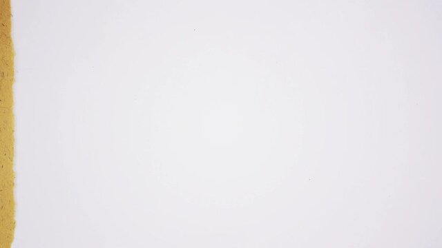 Tears off part of paper stop motion animation. Blank paper background concept of two colors. Old paper background. 4k