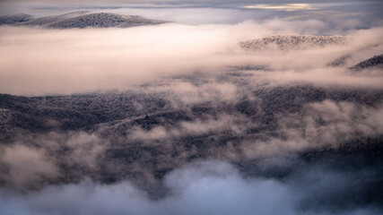 Naklejka premium Mountain peaks over the clouds. An unigue vista. Bieszczady National Park. Carpathians. Poland.