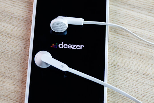 Spotify and Deezer mobile phone applications. Spotify and Deezer are two biggest music streaming platforms