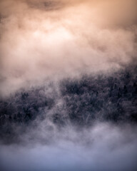 Fototapeta na wymiar Mountain peaks over the clouds. An unigue vista. Bieszczady National Park. Carpathians. Poland.