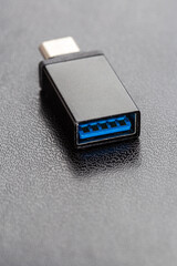 Black USB OTG (USB on The Go) for connection betwen cellphone and flash disk drive